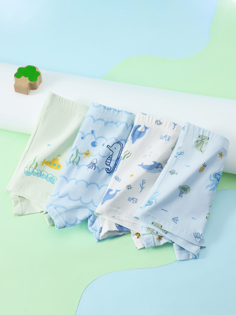 Folded boys' underwear with playful ocean-themed prints