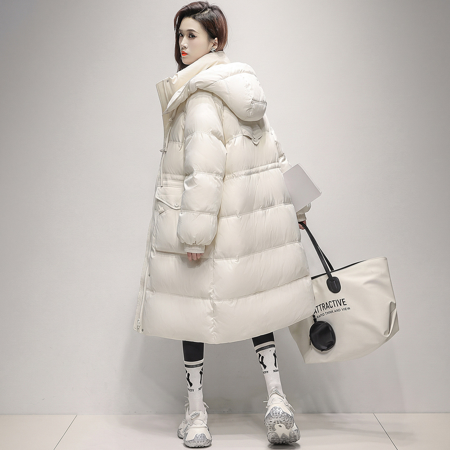 云朵大被子90鸭绒羽绒服2026秋冬女长款立领连帽流苏盘扣外套