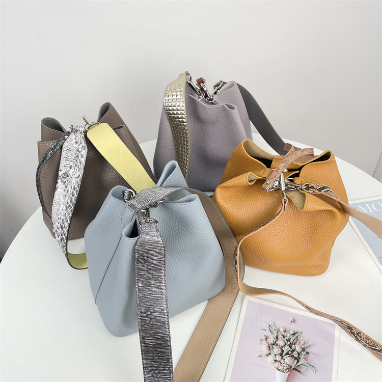 H1外单~26新款水桶包女撞色宽肩带手提斜挎包质感女包多用单肩包