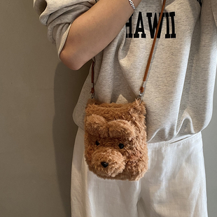 儿童秋冬季超火毛绒斜挎小包包女2025新款可爱小狗狗耳机毛毛包包