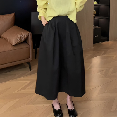 今年流行设计感黑色半身裙女2025春季新款气质时尚大码a字大摆裙