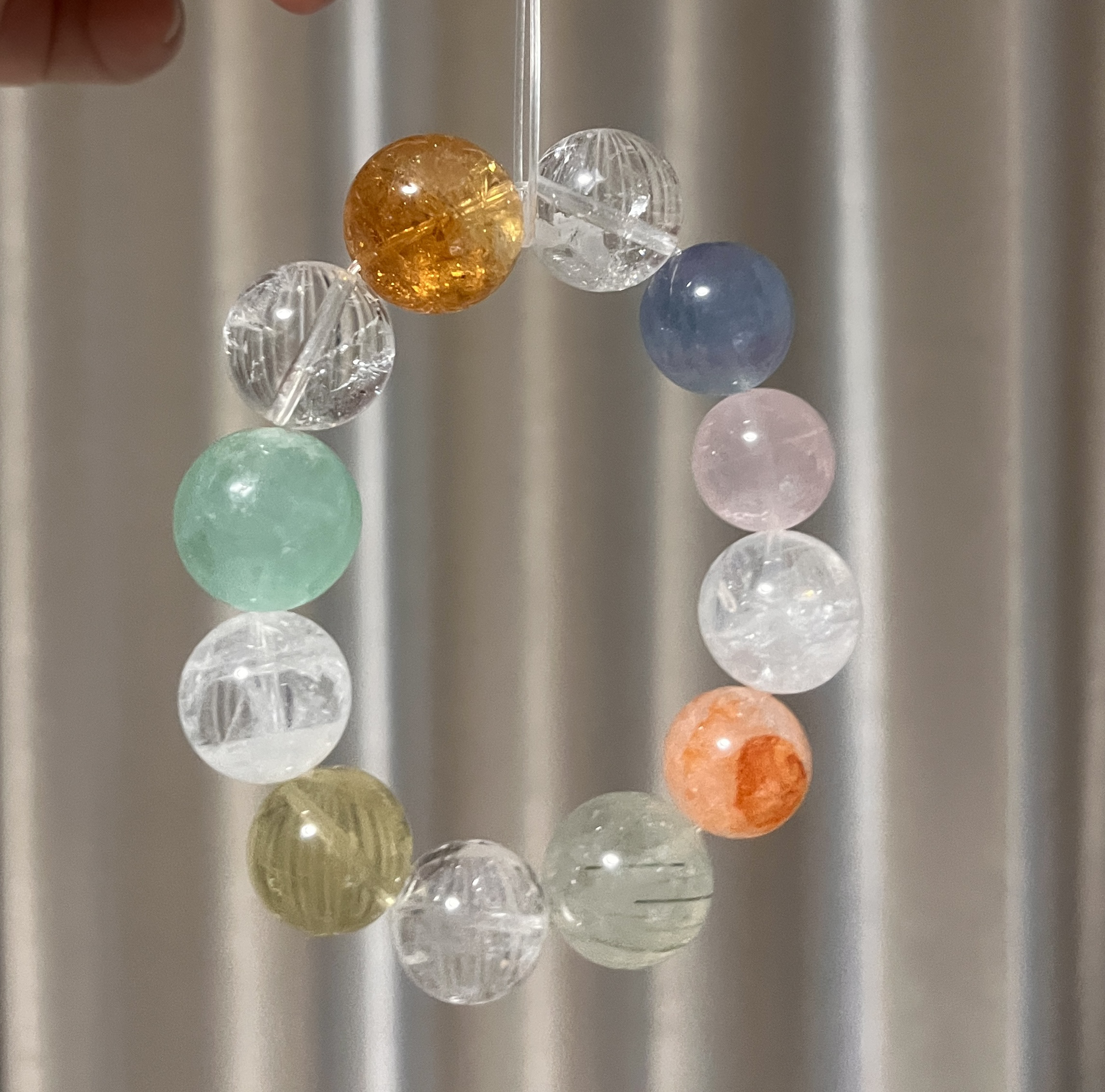 天然水晶多宝大颗粒能量海蓝宝月光石黑金绿兔毛多宝手串原创设计