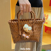 新款 ins风小众雏菊猫咪高颜值仿藤编编织手提包轻便携式 出游小包