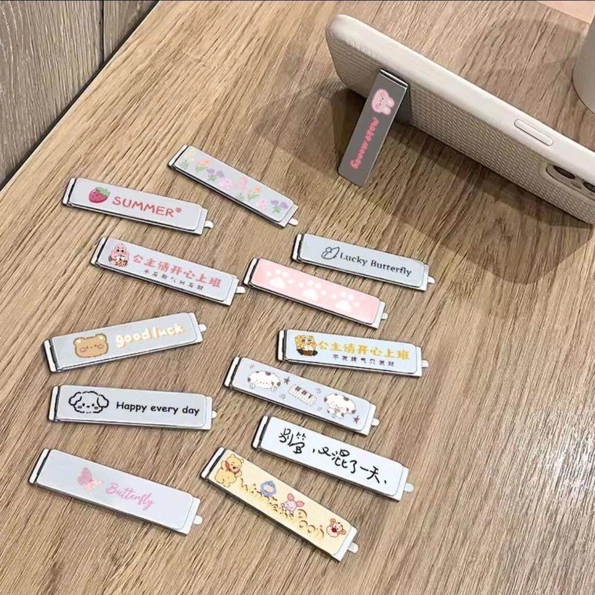 金属折叠隐形卡通手机支架可爱便携背贴新款网红桌面通用粘贴支撑