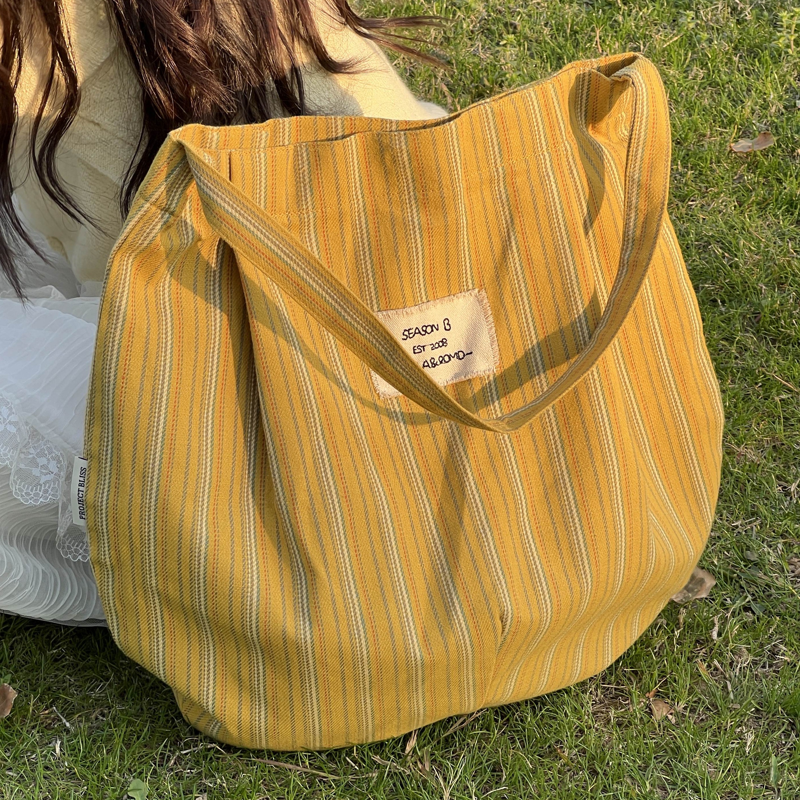 新款百搭条纹帆布袋大容量通勤包