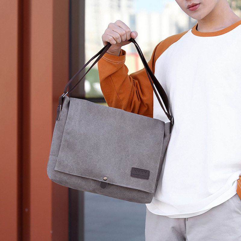 日本ぜいた跨境男士斜挎包包复古邮差包男包帆布包单肩包休闲通勤