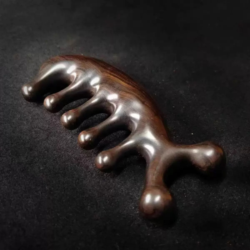 紫光檀木海豚按摩梳头皮经络头部