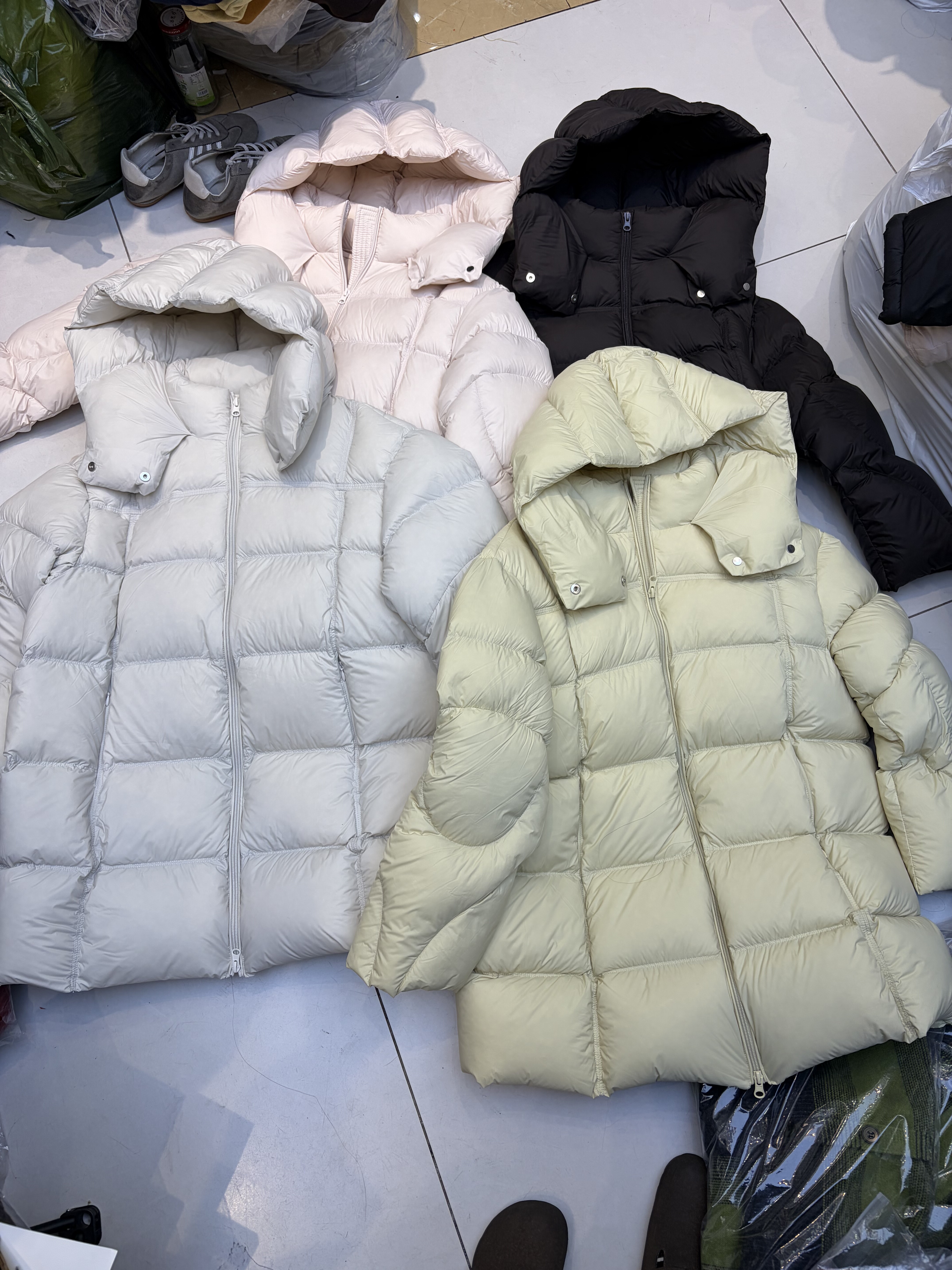 90白鸭绒中长款连帽羽绒服女2025冬新无胆重工轻薄保暖外套舒适