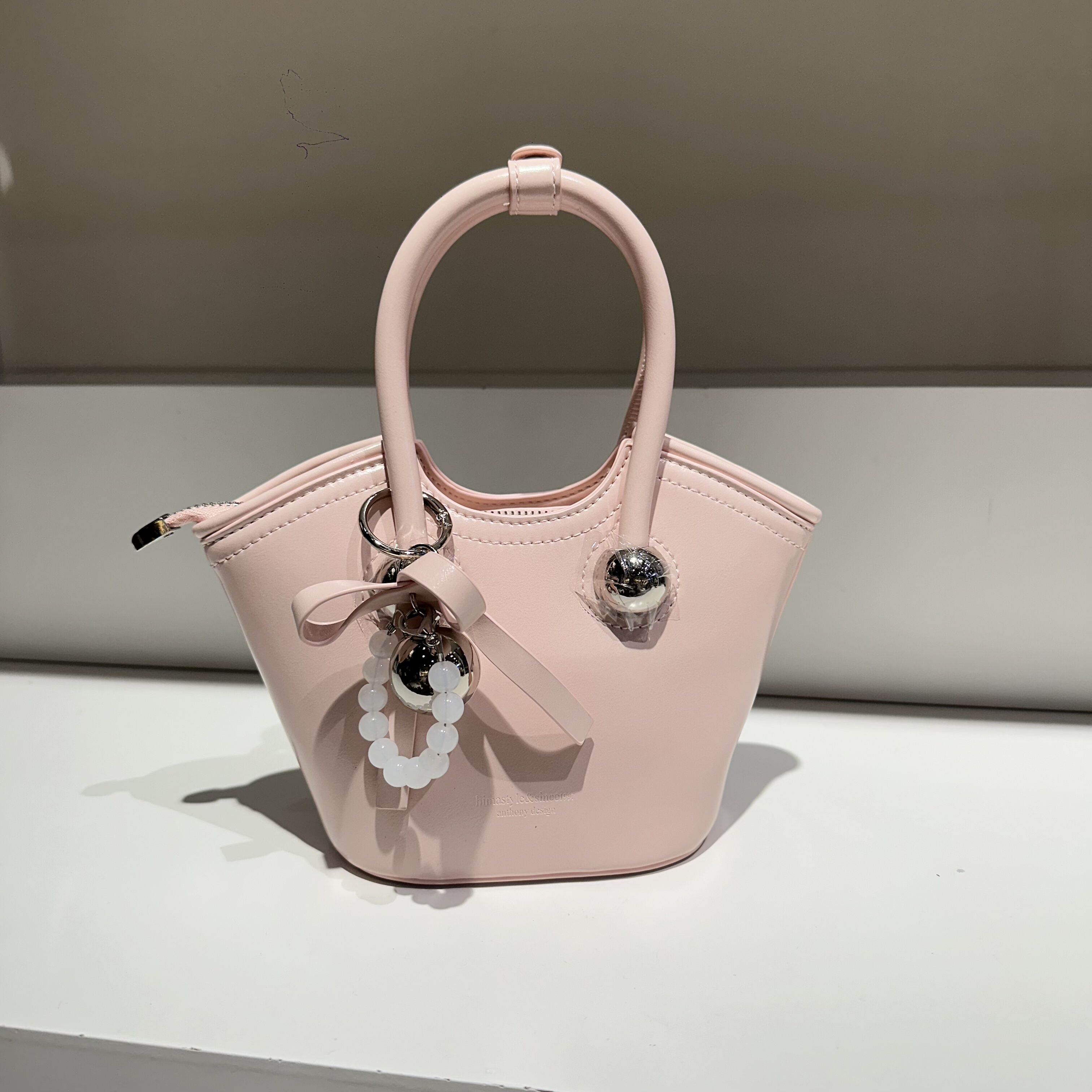 新款复古休闲慵懒风软皮手提菜篮子包斜挎女包纯色简约分层实用包