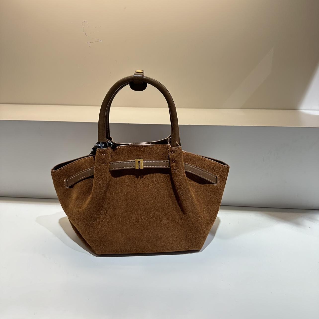 康康家秋冬新款磨砂皮轻便手提饺子包纯色时髦高级感洋气斜挎子母