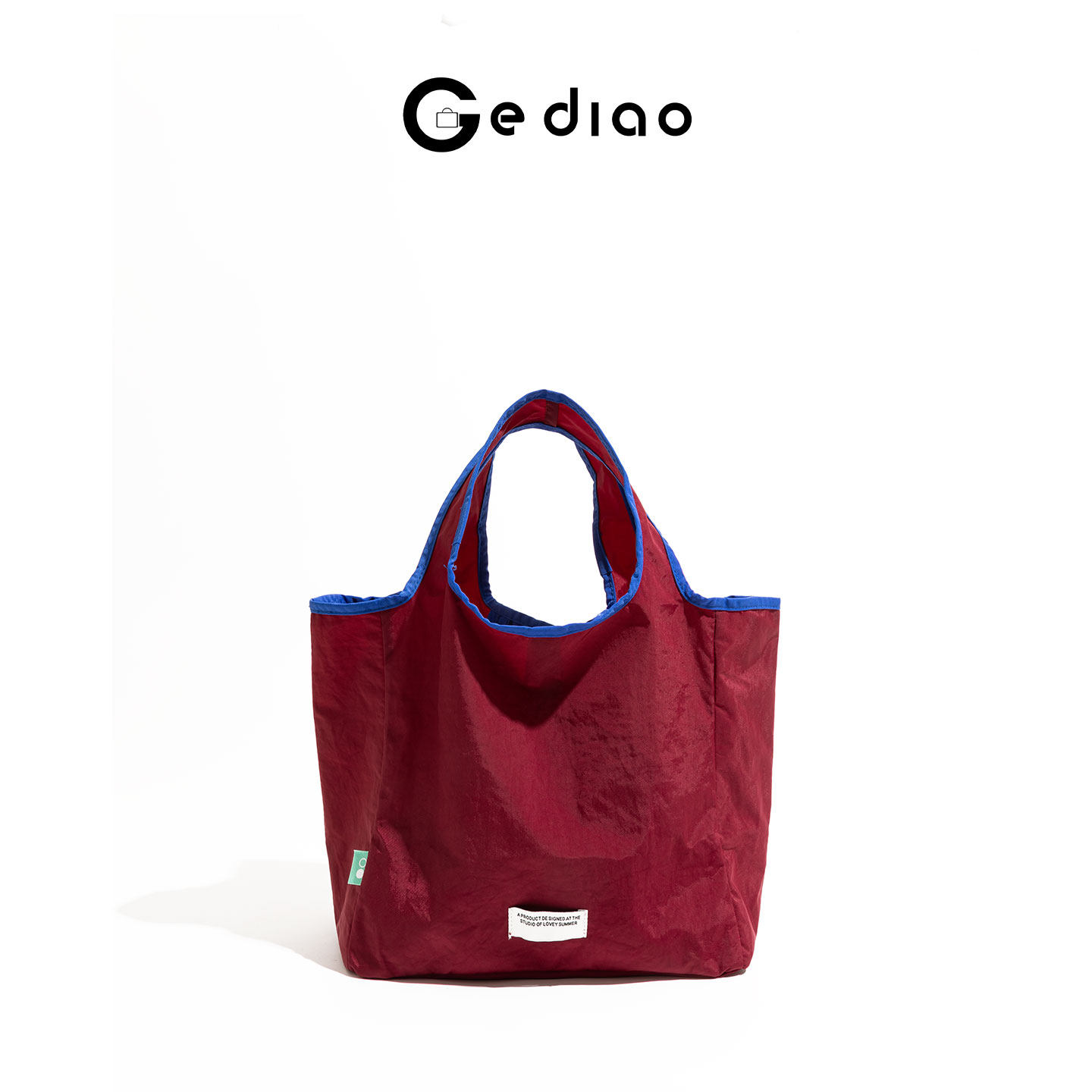 格调studio新加坡复古酒红色尼龙包包2025年新款妈咪包手提单肩包