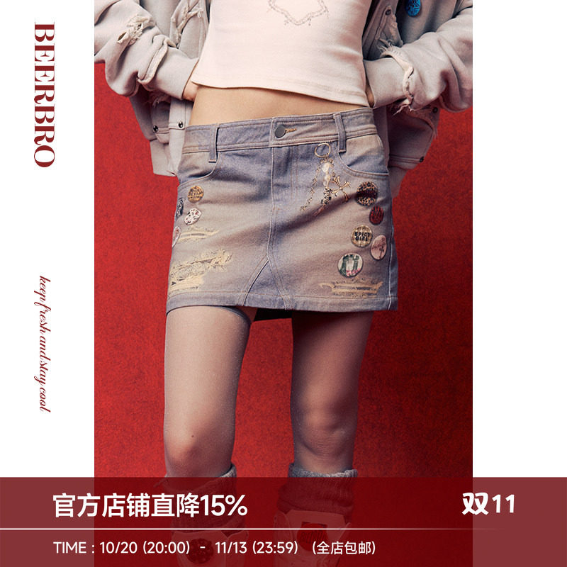 BeerBro 美式辣妹徽章破洞印花小A字牛仔短裙女秋冬修身半身裙