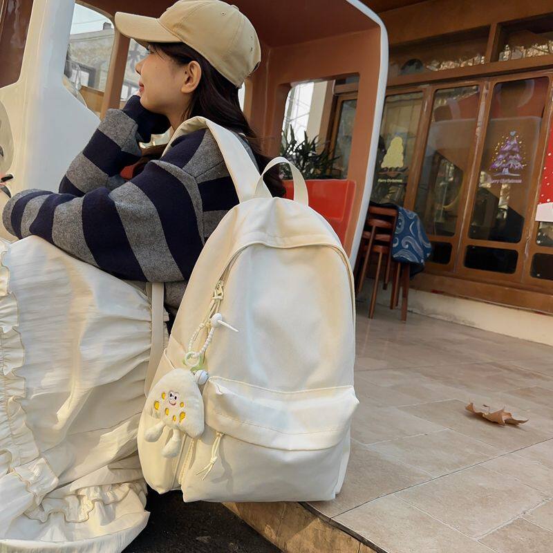 森系纯色大学生书包女韩版百搭简约背包可爱日系初高中通勤双肩包