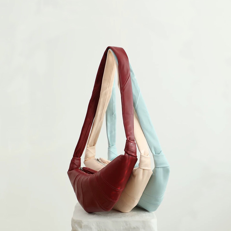 真皮可颂牛角包女2025新款头层羊皮大容量单肩斜挎包高级感饺子包