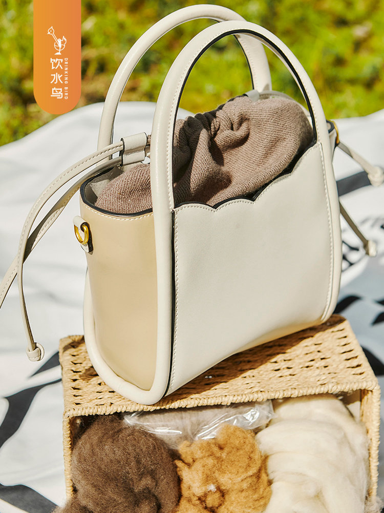 饮水鸟牦牛绒手工氆氇牛皮包民族风休闲编织斜挎单肩桶包大容量