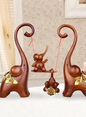树脂工艺品 欧式木色荡秋千三口象摆件 创意客厅电视柜家居装饰品