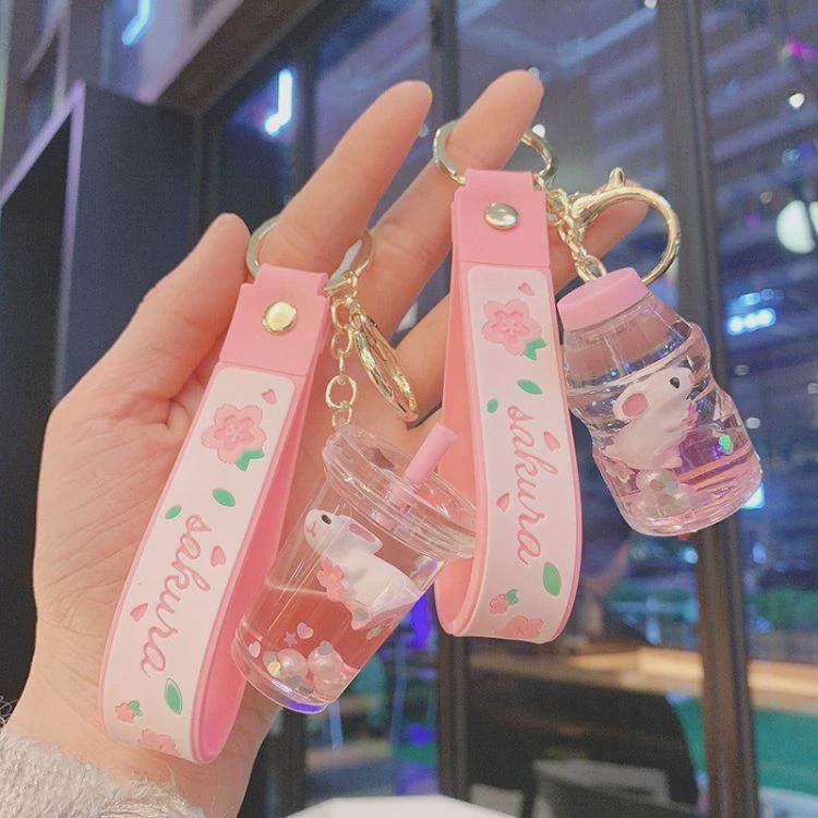 炫彩入油小兔子水晶球漂浮瓶钥匙扣少女可爱流沙球挂件学生包挂饰