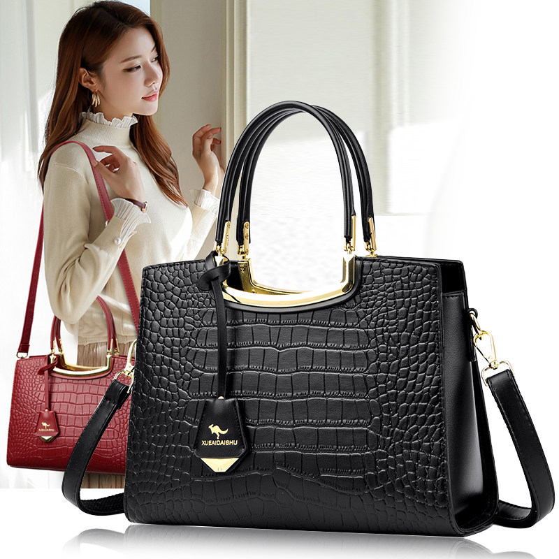袋鼠品牌真皮女士手提包2025新款亮皮鳄鱼纹妈妈斜挎包百搭牛皮包
