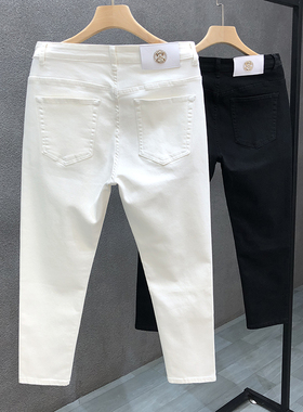 香港2025年新款白色牛仔裤男秋季九分裤男士修身小脚潮流黑色裤子