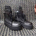 Thick sole with all black crocodile skin pattern