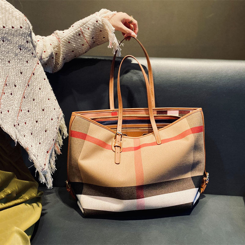 时尚休闲大容量真皮女包2026新款高档格子包牛皮购物袋单肩大包女