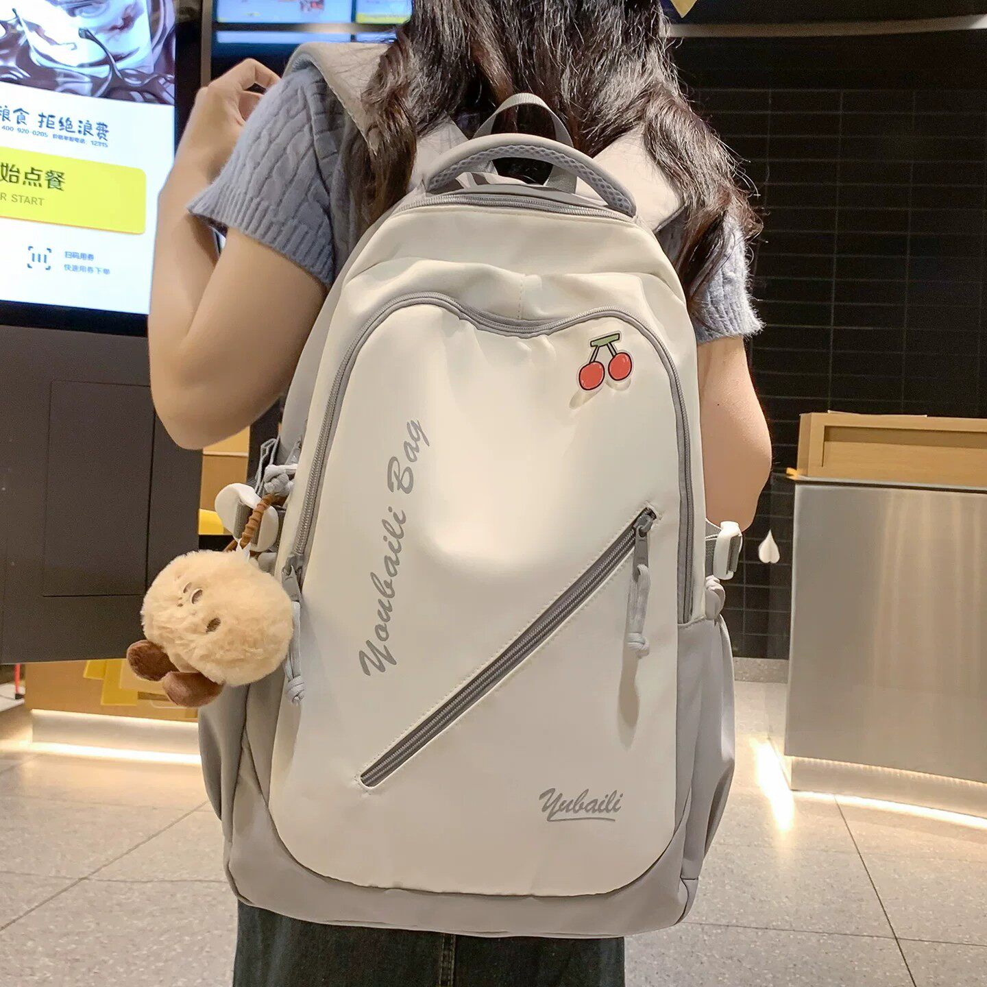 韩版书包女生初中生高颜值小众背包男高中生大容量轻便电脑双肩包
