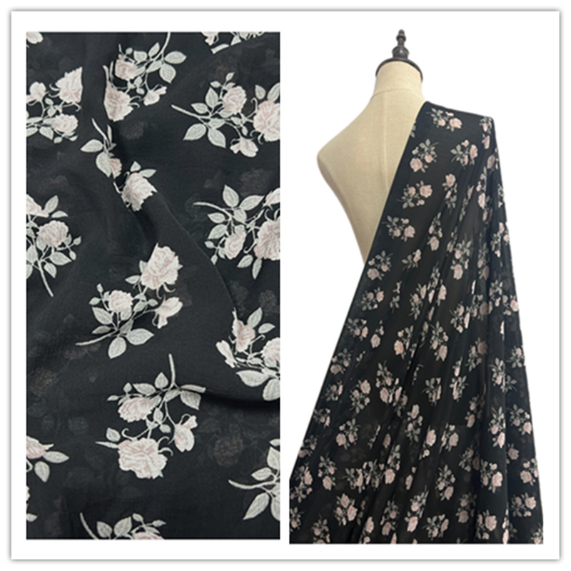 无弹性泡泡皱雪纺春夏季印花面料黑底粉玫瑰单层透连衣裙服装布料