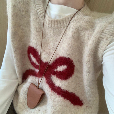 甜美减龄蝴蝶结浣熊马甲