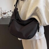 今年流行斜挎帆布包女2024新款 简约大容量学生装 书上课单肩饺子包