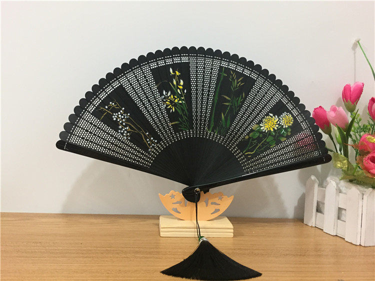 中国风雕刻镂空流苏全竹扇子日式古风男女红黑纯色小巧舞蹈扇折扇