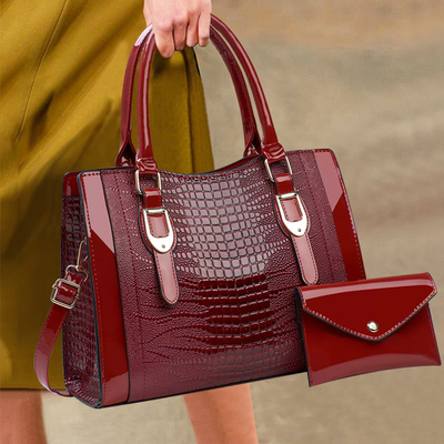 香港真皮时尚鳄鱼纹包包2026新款时尚女包通勤手提包大容量斜挎包