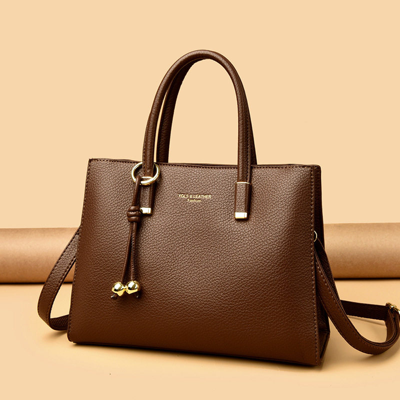 香港真皮高级感手提包女2025新款单肩斜挎包大容量时尚女包妈妈包,箱包皮具/热销女包/男包,通用款女包,淘宝优惠券,粉丝福利购,淘宝优惠卷