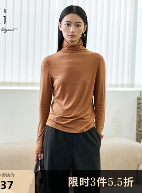 XG雪歌桔黄色长袖高领T恤2025冬季新款修身堆堆领打底休闲上衣女