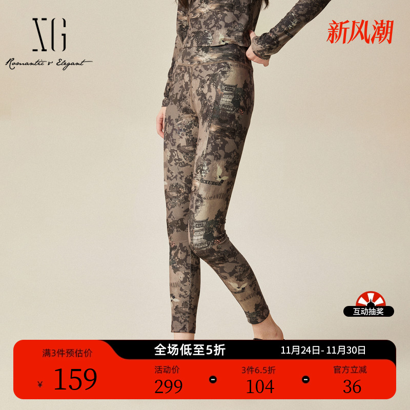 XG雪歌印染设计通勤休闲裤时尚冬季新款创意满版印花铅笔长裤女装