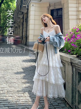 白色吊带连衣裙女夏2026新款法式绝美蕾丝拼接超仙海边度假吊带裙
