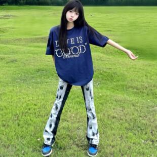 美式高街轻奢潮牌穿搭快手网红泼墨牛仔裤男女同款修身弹力小脚装