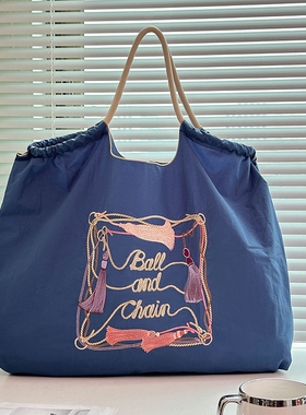 麦町汀日系ball chain刺绣蓝色流苏环保购物袋斜挎帆布单肩通勤包