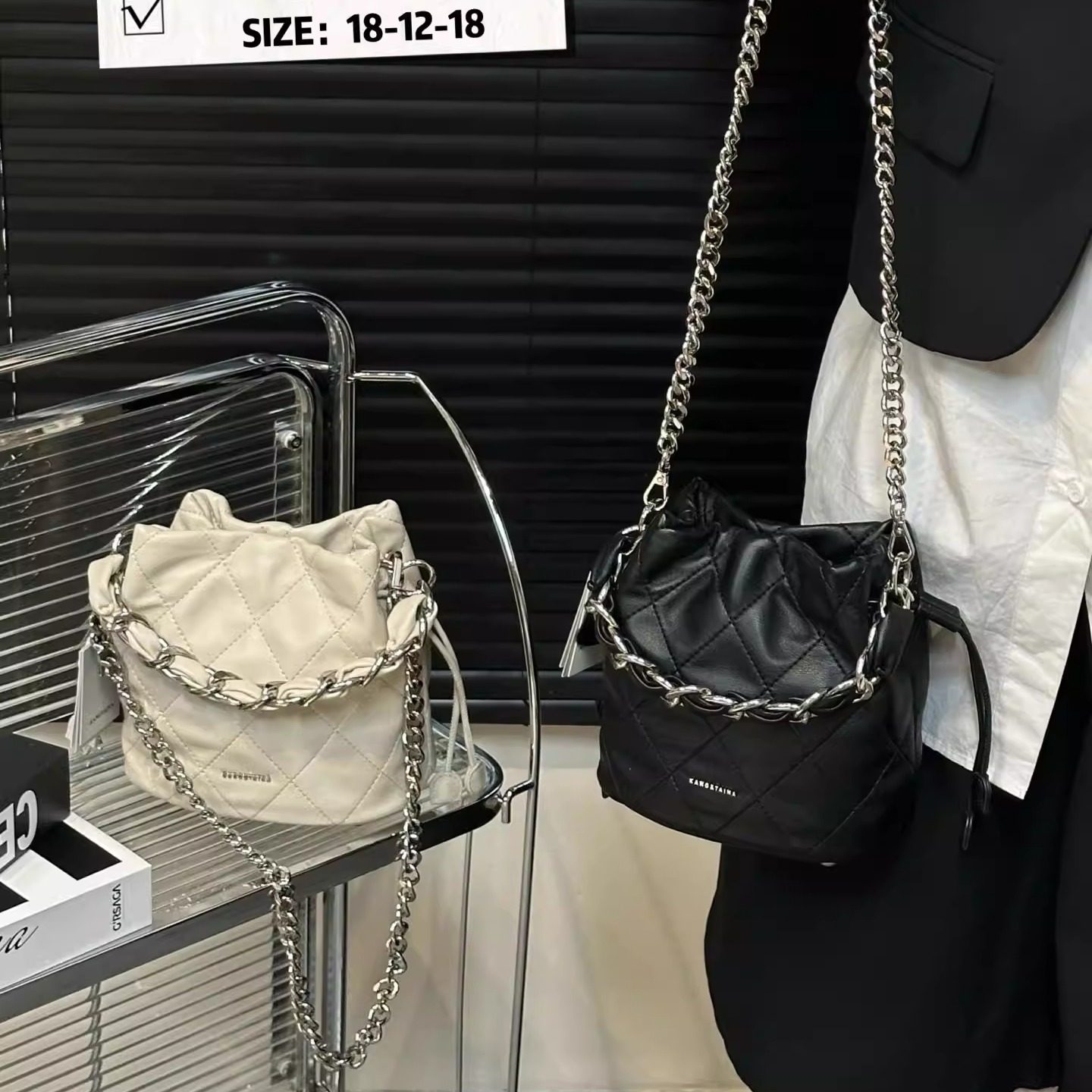 高级感羊皮菱格链条包抽带水桶包女2026新款时尚手提单肩斜挎小包