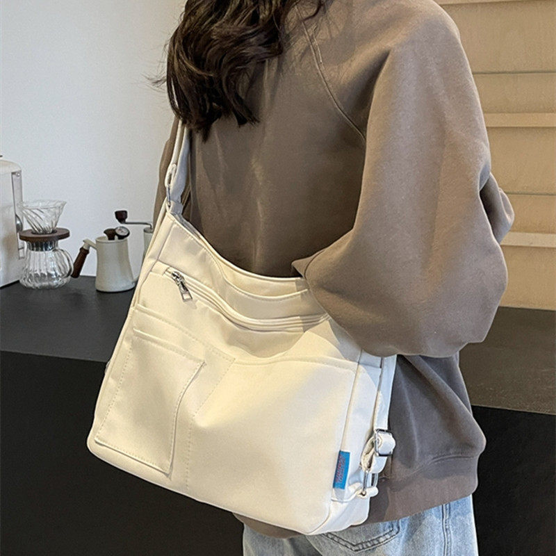 日系简约帆布斜挎包ins潮大容量休闲多兜纯色学生单肩背包邮差包
