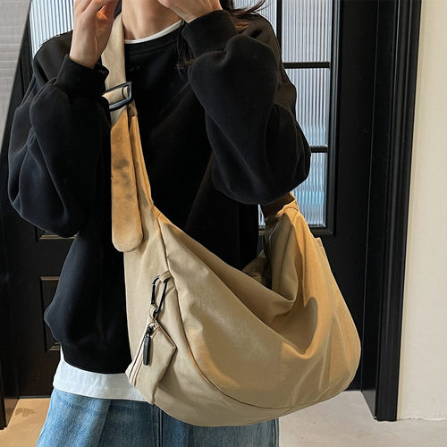 ins风休闲百搭韩版帆布包斜挎包女学生党上课通勤大容量饺子包男