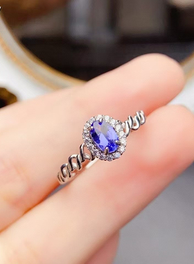 天然坦桑石戒指晶体全净火彩爆闪，S925银精工镶嵌主石4*6mm。