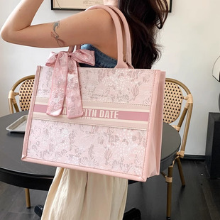 大容量手提通勤托特包女士2025新款夏季流行单肩包休闲粉色帆布包