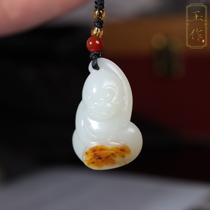 玉作新疆和田玉籽料白玉红皮猴