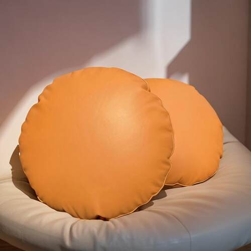 纳帕橙色圆形头层牛皮质真皮抱枕