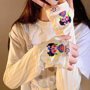 薄款可爱卡通冰丝防晒袖套女夏季宽松防紫外线遮阳冰袖长袖
