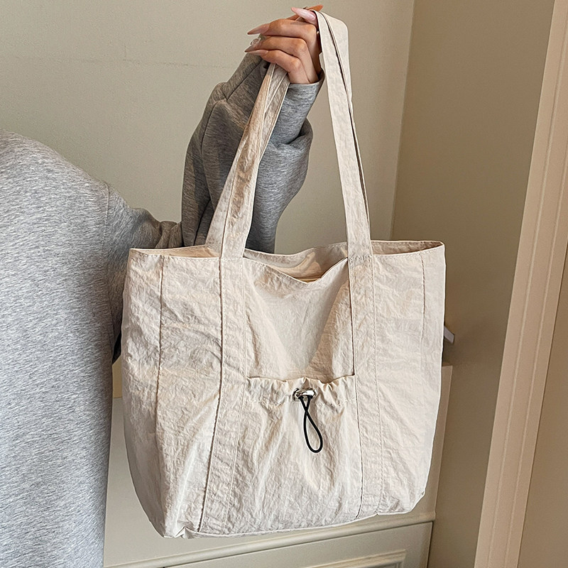 大容量托特包包女2026新款潮韩版轻便手提单肩包时尚通勤包大包女