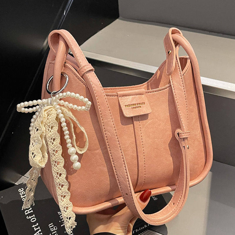 小众设计包包女2025春夏新款韩版大容量单肩腋下包百搭斜挎水桶包,箱包皮具/热销女包/男包,腋下包,淘宝优惠券,粉丝福利购,淘宝优惠卷