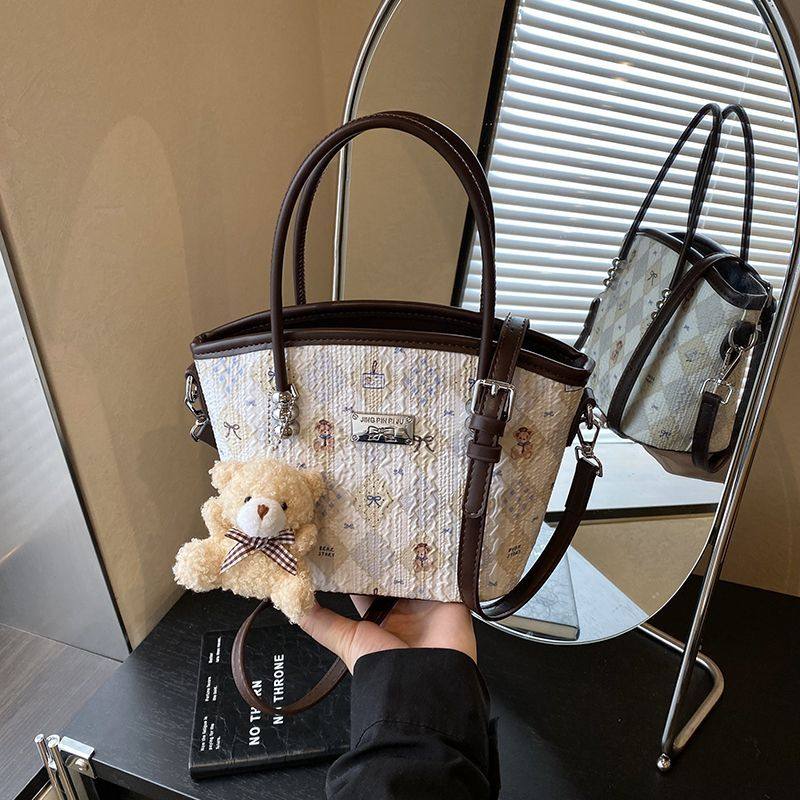 包包女式2025新款超火小众设计款手提小拎包韩版休闲斜挎水桶包女,箱包皮具/热销女包/男包,小方包,淘宝优惠券,粉丝福利购,淘宝优惠卷