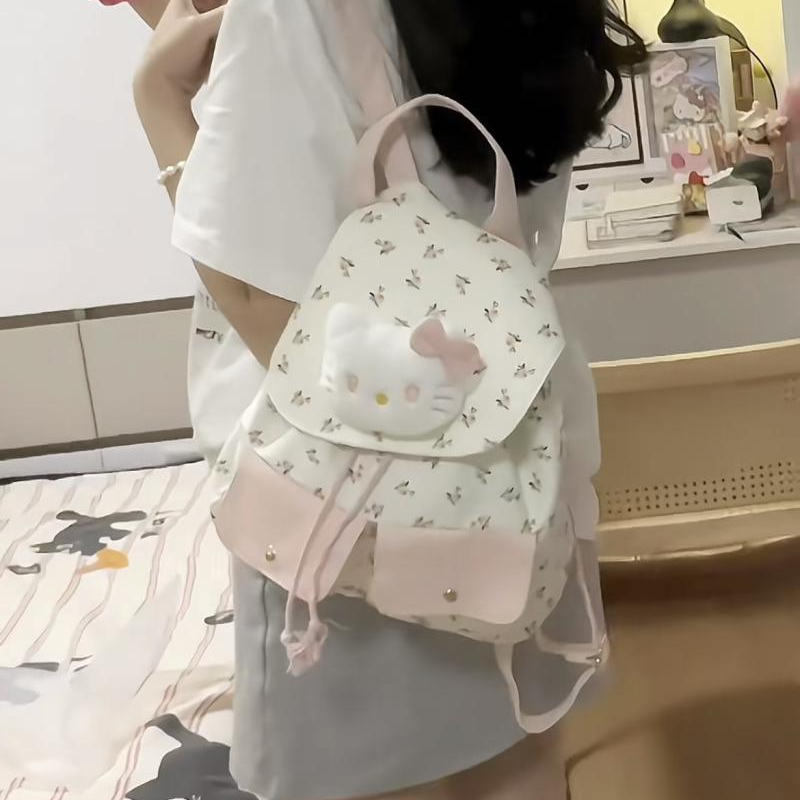 春季新款可爱卡通猫咪碎花帆布双肩包高颜值少女背包通勤大容量包