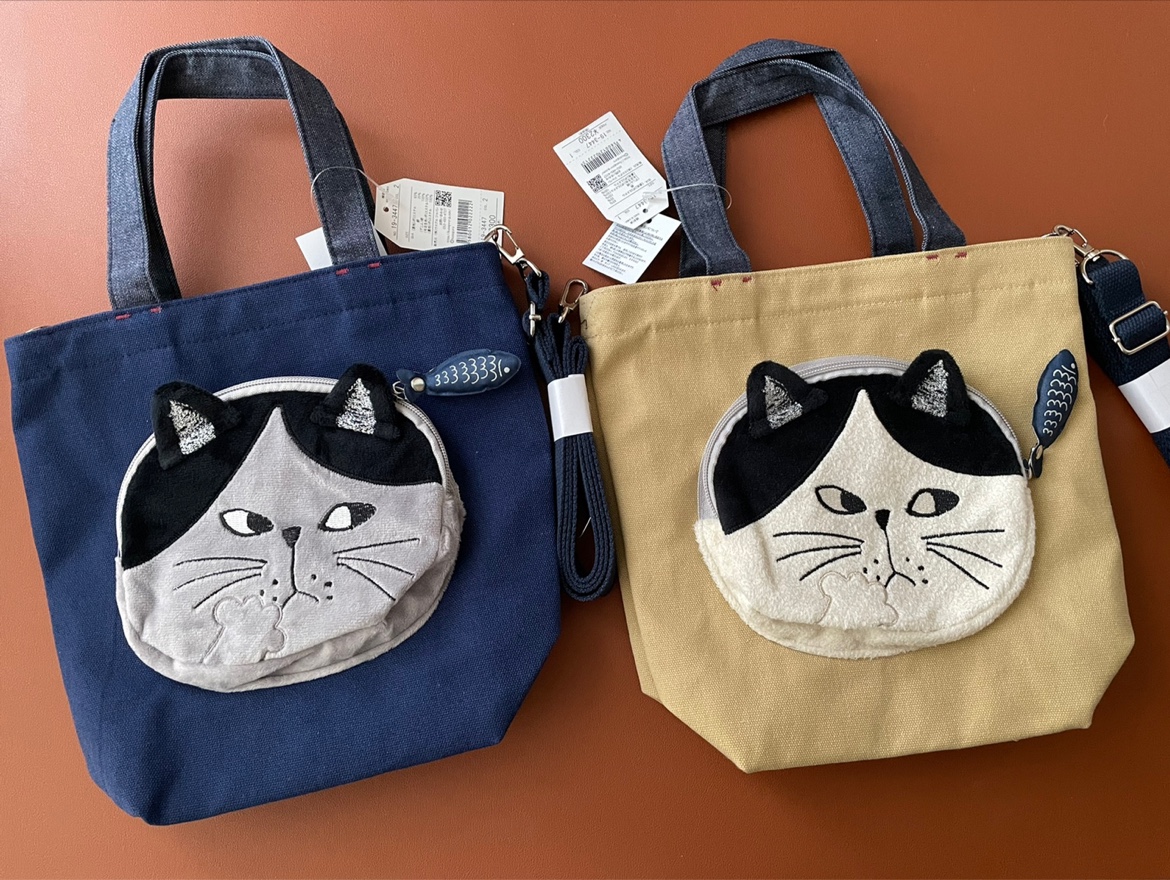 立体猫脸口袋 硬帆布手提斜挎包